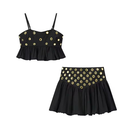 Black ZAYA co-ord set with metal eyelets and high waist A-line skirt – perfect for night-out looks
