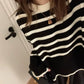 Cozy striped pullover sweater for women – stylish O-neck design in soft fabric for casual wear.